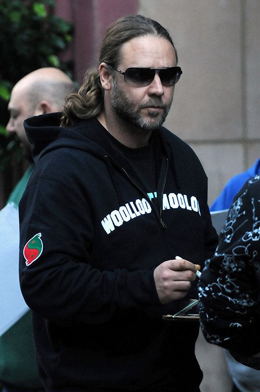 Russell Crowe signs autographs for fans outside his Manhattan hotel. Pictured: Russell Crowe Ref: SPL53889 071008  Picture by: Doug Meszler / Splash News Splash News and Pictures Los Angeles: 310-821-2666 New York: 212-619-2666 London: 870-934-2666 photodesk@splashnews.com 