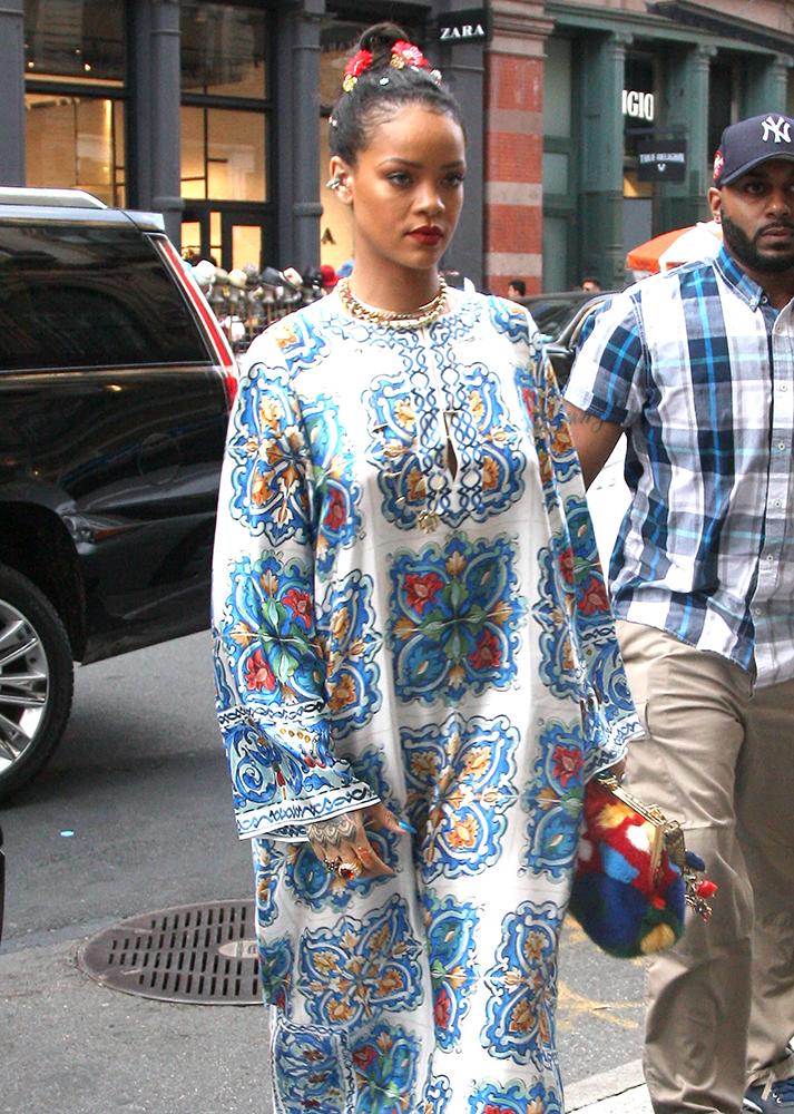Rihanna steps out in Soho wearing a with flowers in her hair and a patterned dressed with platforms. Pictured: Rihanna Ref: SPL1290990  290516   Picture by: Said Elatab / Splash News Splash News and Pictures Los Angeles:310-821-2666 New York:212-619-2666 London:870-934-2666 photodesk@splashnews.com 